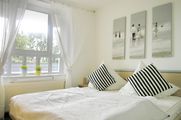Schlafzimmer mit Doppelbetten